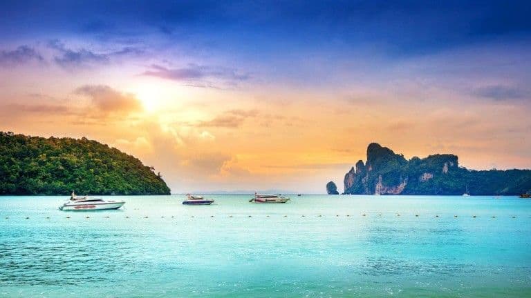 The bay at sunset with the boats in from the last dive