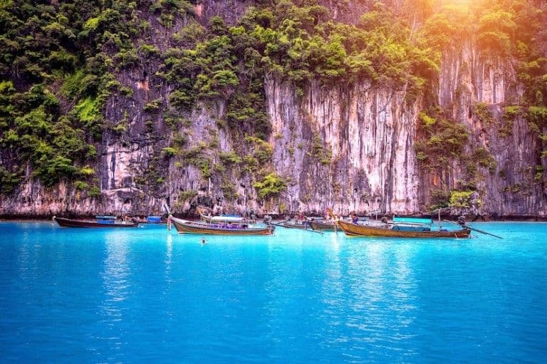 Limestone cliffs dropping into turquoise water
