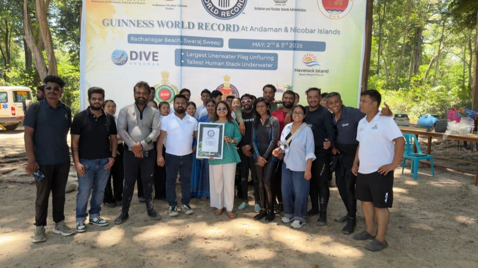 The dive team with their record certificate